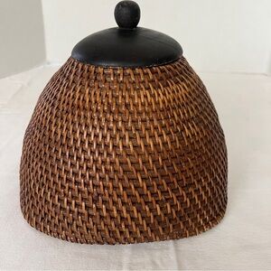 Vintage hand-woven rattan wicker storage basket with a lid